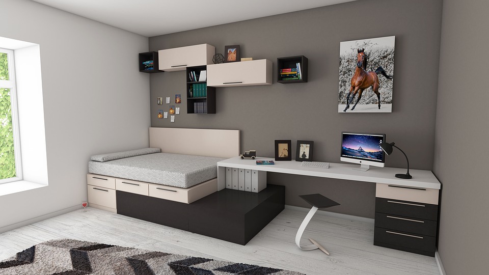 clean bedroom with a desktop computer